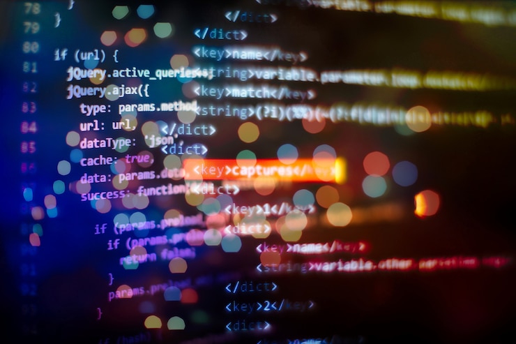 Photo software developer programming code. abstract computer script code.