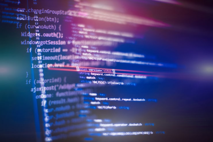 Photo software developer programming code. abstract computer script code.