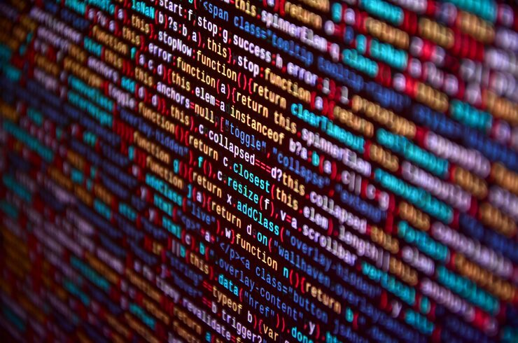 Photo software developer programming code on computer. abstract computer script source code