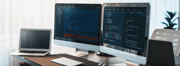 Photo software development interface display coding script on monitor. empty tech developer company office with computer screen showing developing software code or website design. trailblazing