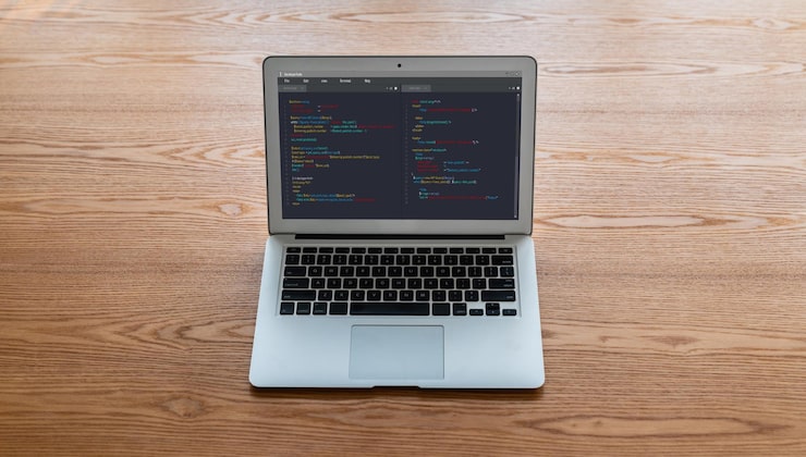 Photo software development programming on computer screen for modish application and program coding