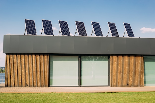 Solar electricity panels on house roof top. Renewable alternative energy