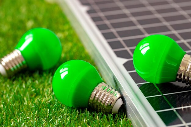 Solar energy panel and light bulb green energy