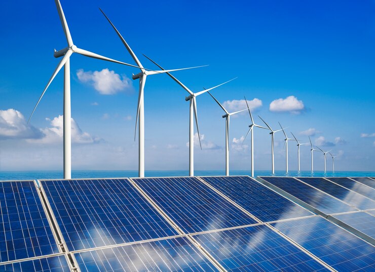 Photo solar energy panel photovoltaic cell and wind turbine farm power generator in nature landscape.