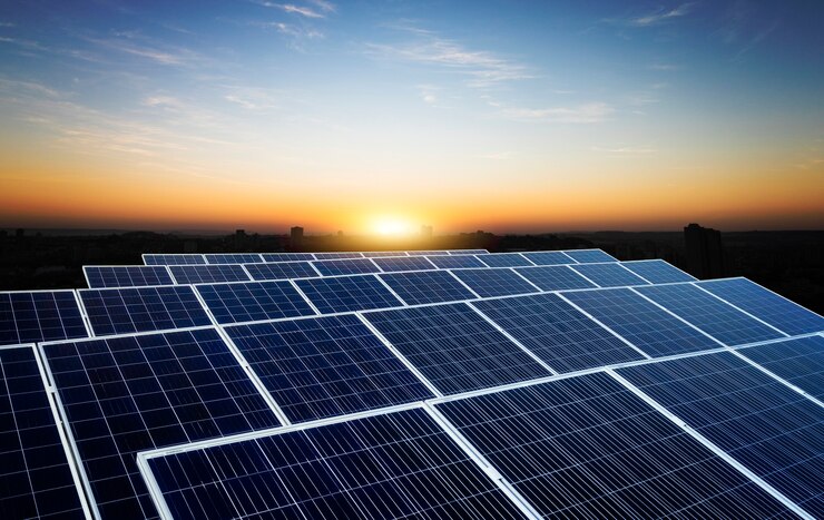Photo solar energy power plant over a beautiful cloudy sky. space for text.