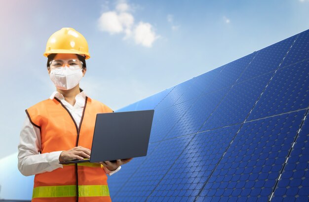 Solar panel technician with 3d rendering solar panel station