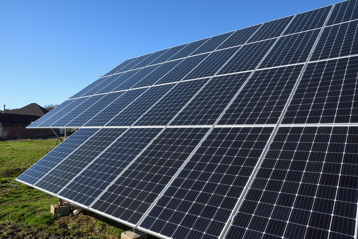 Photo solar panels against blue sky background.against the deep blue sky in suny weather
