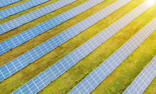 Solar panels against deep blue sky, alternative solar energy