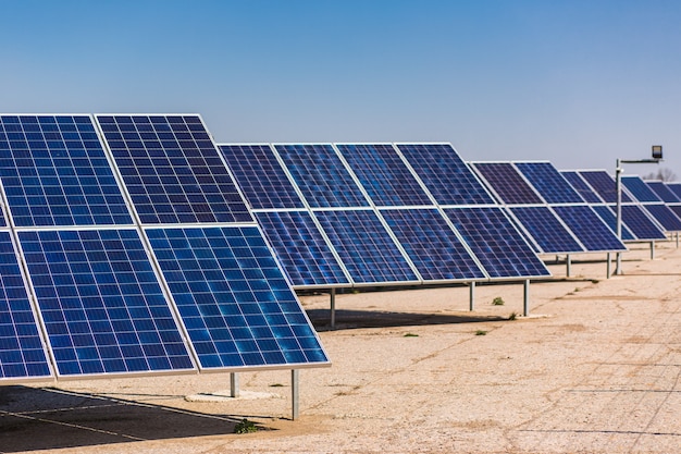 Solar Panels Against The Deep Blue Sky