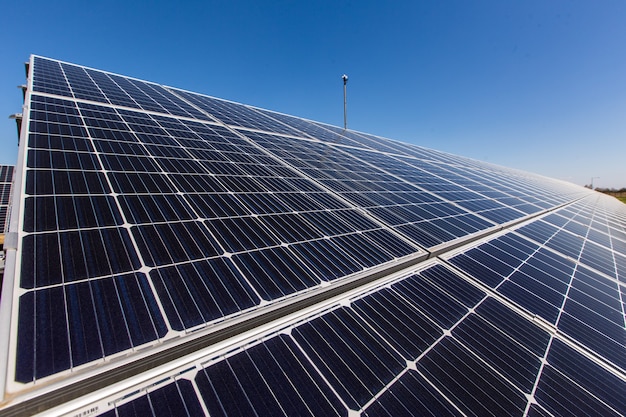 Solar Panels Against The Deep Blue Sky