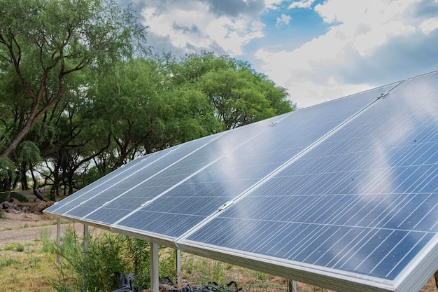 Solar panels on a green landscape field