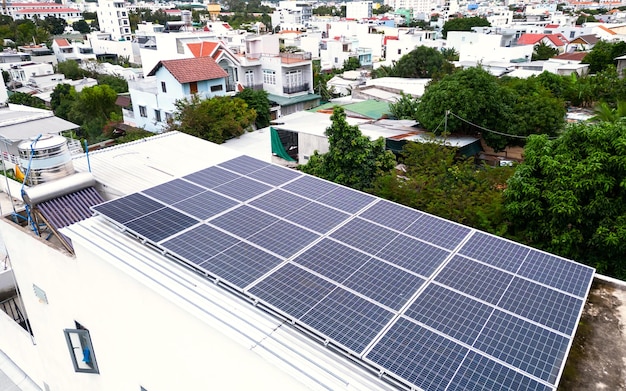 Photo solar panels installed on private house drone view