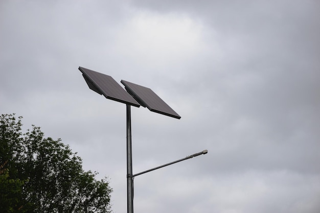 Solar panels on a pole against the background of the sky