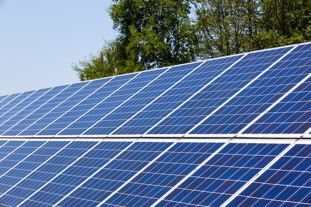 Solar panels on the sky background Solar power plant The alternative source of electricity