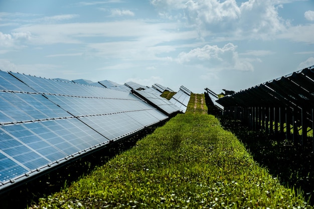 Solar panels on the sky background Solar power plant Blue solar panels Alternative source of elec