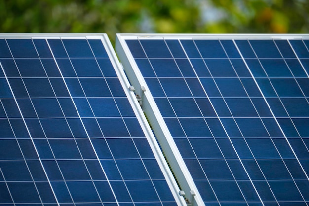 Solar photovoltaic panels mounted on standalone frame on backyard ground for generating of clean ecological electric energy Concept of autonomous house