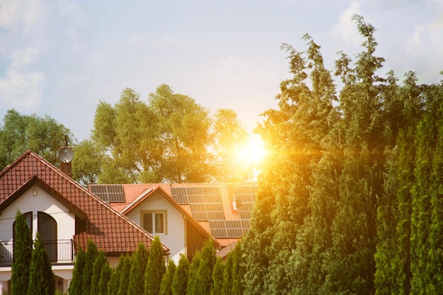 Photo solar power energy on the roof to a standard house