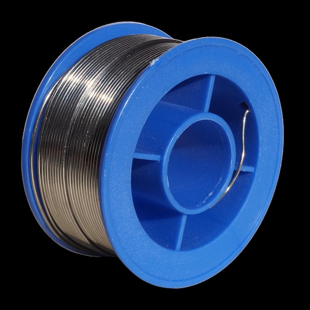 Solder wire spool over black