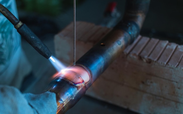 soldering copper pipes with a gas burner