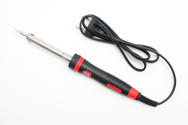 Soldering iron for electricians on an isolated white background