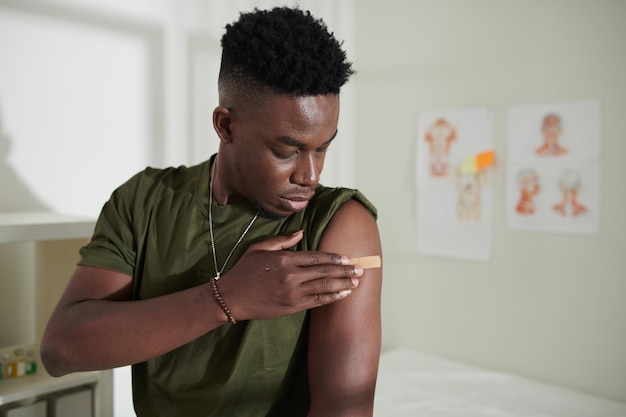 Soldier Covering Injection Site