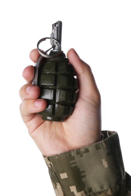 Soldier holding hand grenade on white background closeup