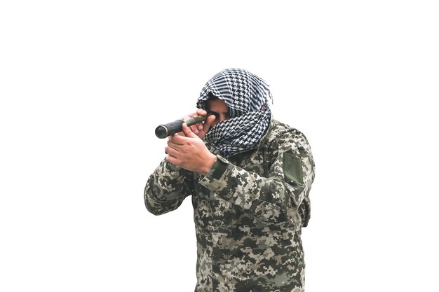 Soldier is standing in the camouflage uniform isolated on white background. Checkered keffiyeh shemagh bandana. Man with knife. Binocular in hands.