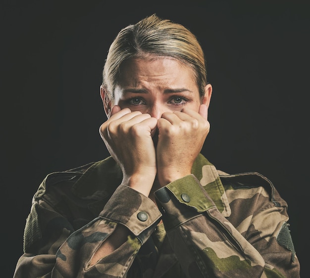 Soldier mental health or woman with ptsd trauma anxiety or depression from civil world or Ukraine war fight Combat dark fear and sad crying army battle or military hero with survivors guilt