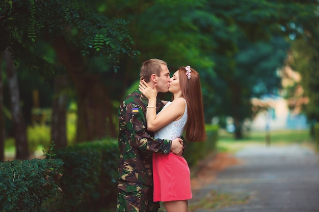 Soldier reunited with his family on a sunny day