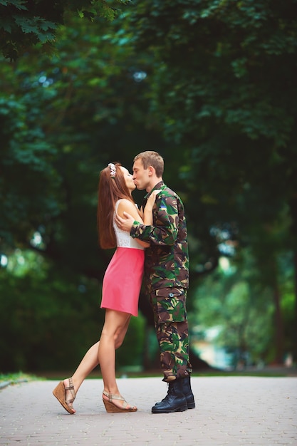 Soldier reunited with his family on a sunny day