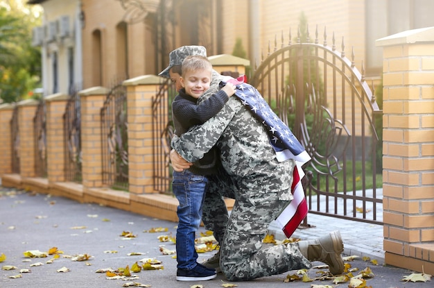 Soldier reunited with his family on a sunny day