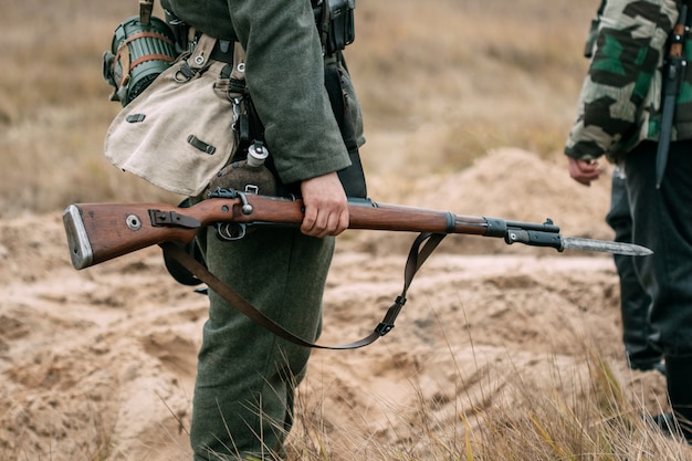 Soldier of the Wehrmacht with a rifle in full gear