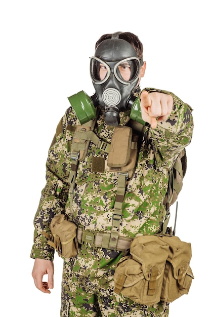 Soldier with gas mask pointing finger at you