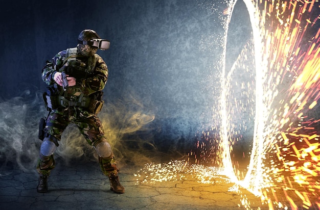 A soldier with virtual reality glasses looks at the ring of fire and holds a gun in his hands The concept of virtual reality Simulation games