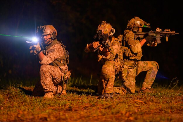 Soldiers ready to fire during Military Operation at night