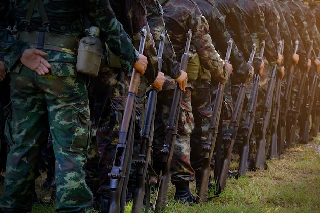 Soldiers stand in row