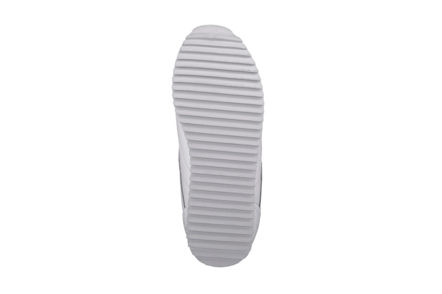 Фото Подошва белых кроссовок из полиуретана на белом фоне низ спортивной обуви из полиэстера