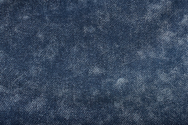 Photo solid background of blue denim.