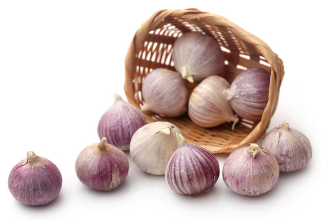 Solo or single clove garlic over white background