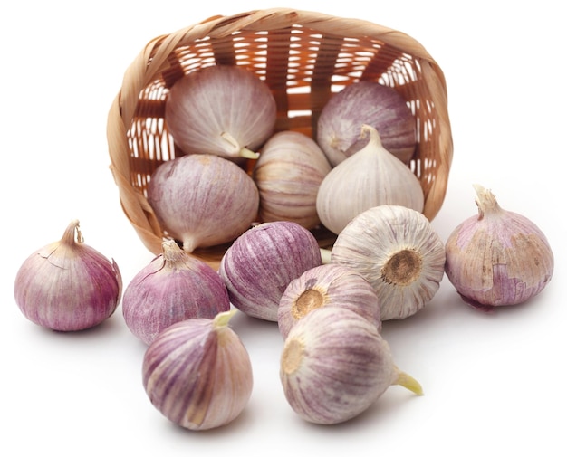 Solo or single clove garlic over white background