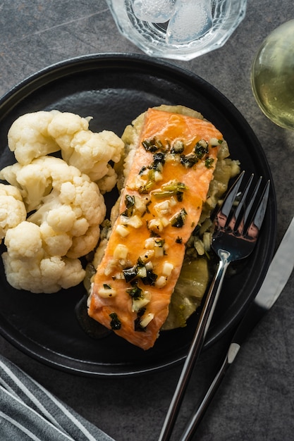 Solomon fillet with pineapple and cauliflower. Fish with vegetables.