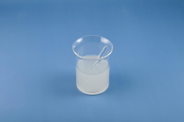 Solution of Xanthan Gum in glass Food additive E415 Used in food industry medicine cosmetics