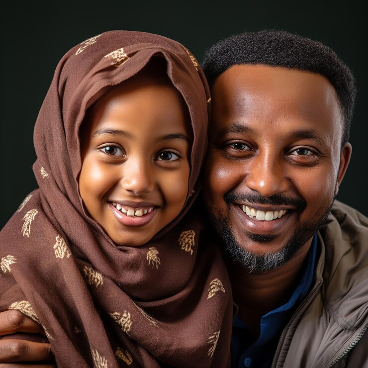 Somali father and his daughter smiling