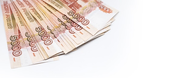 Some five thousand rubles bills Stack of Russian cash on white