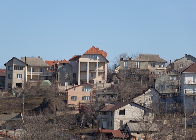 Some houses on a hill with blue sky in the spring