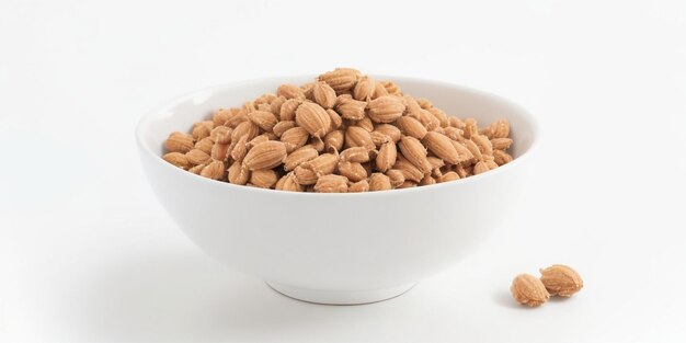 Some nuts on a bowl with white background