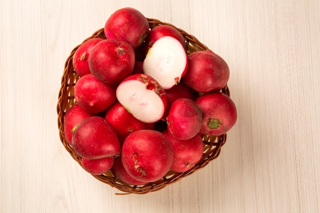 Some radishes in a basket. Fresh vegetable