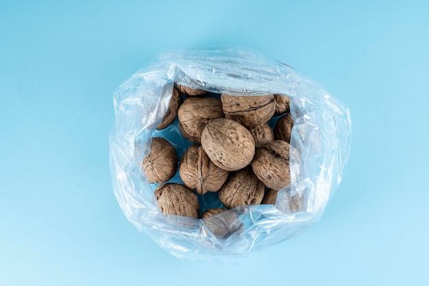 Some walnuts in a plastic bag