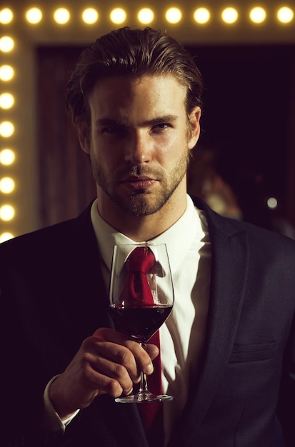 Sommelier or man hold wine glass, meeting and relax