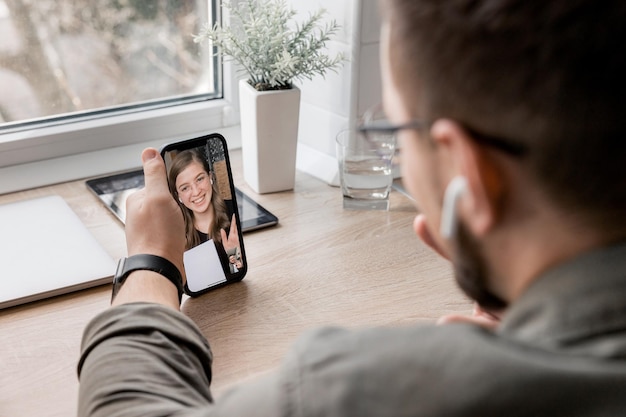 Sommunication with his lovely wife at a distance due to the war in Ukraine Video call concept